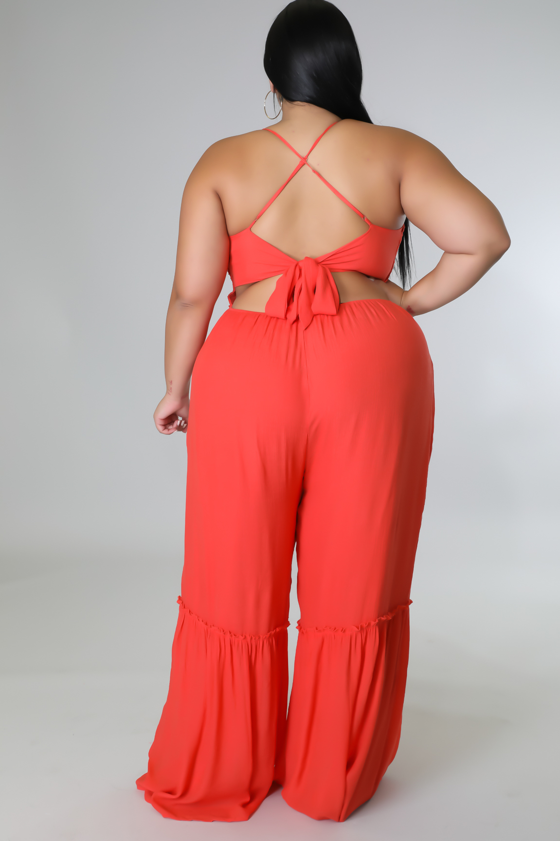 Coral Tie-Back Flare Jumpsuit — plus-size Coral jumpsuit made for curves