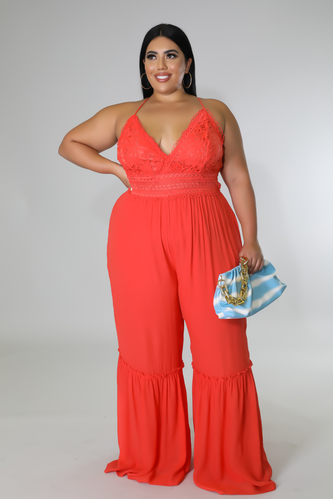 Coral Lace Bustier Flare Jumpsuit — plus-size Coral jumpsuit made for curves